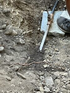 Concrete slab placed beneath valve for stability