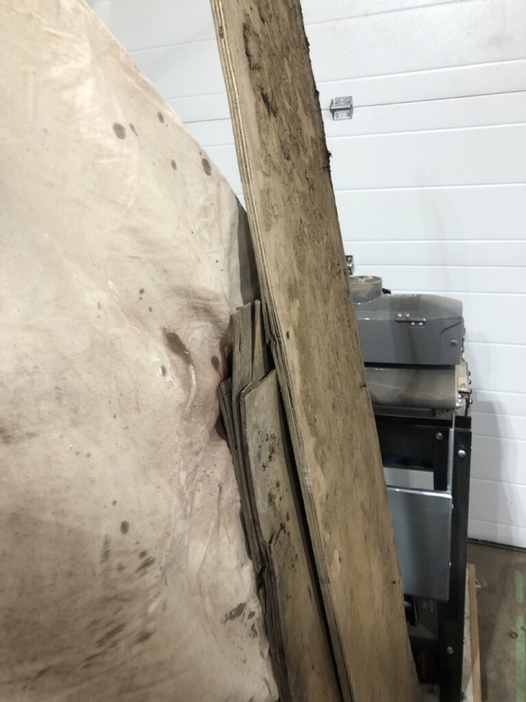 Delaminated trailer floor boards removed
