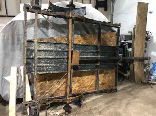 Wheels removed and frame bottom exposed